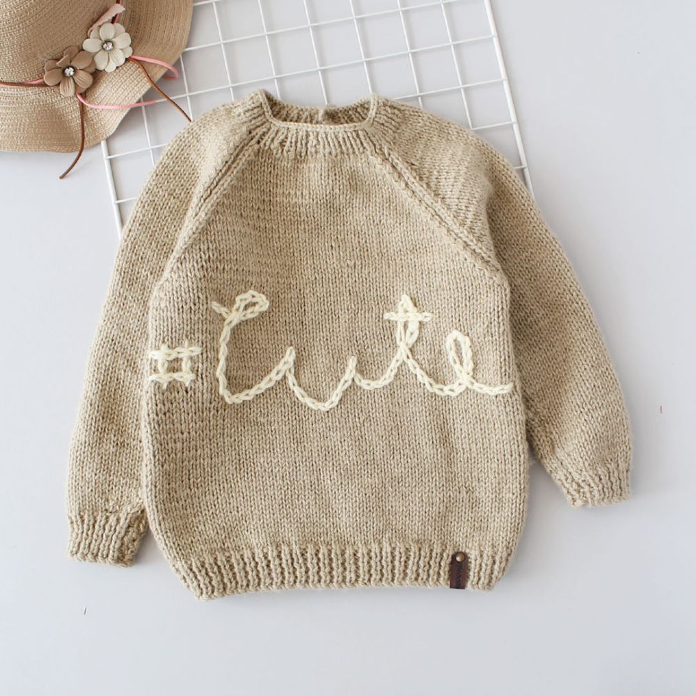 Beige Colored With White Color Text Pattern Cozy Sweater