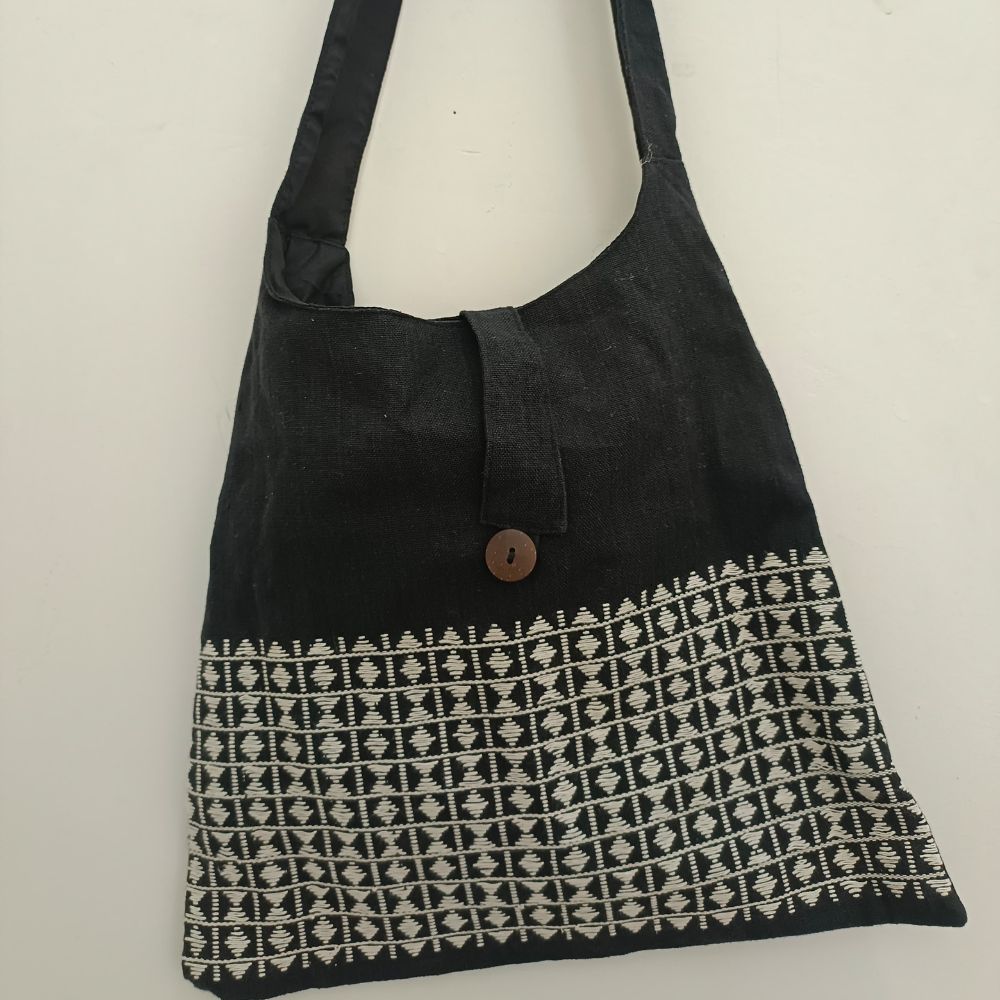 Dazzling Black Pattu Bag